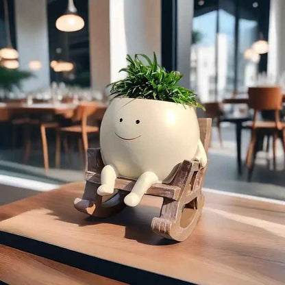 Handgefertigte Pflanzentöpfe im süßen Lach-Design